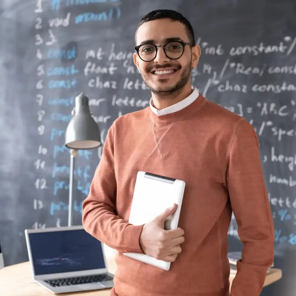 cheerful-young-it-specialist-2025-03-15-15-31-32-utc (1)